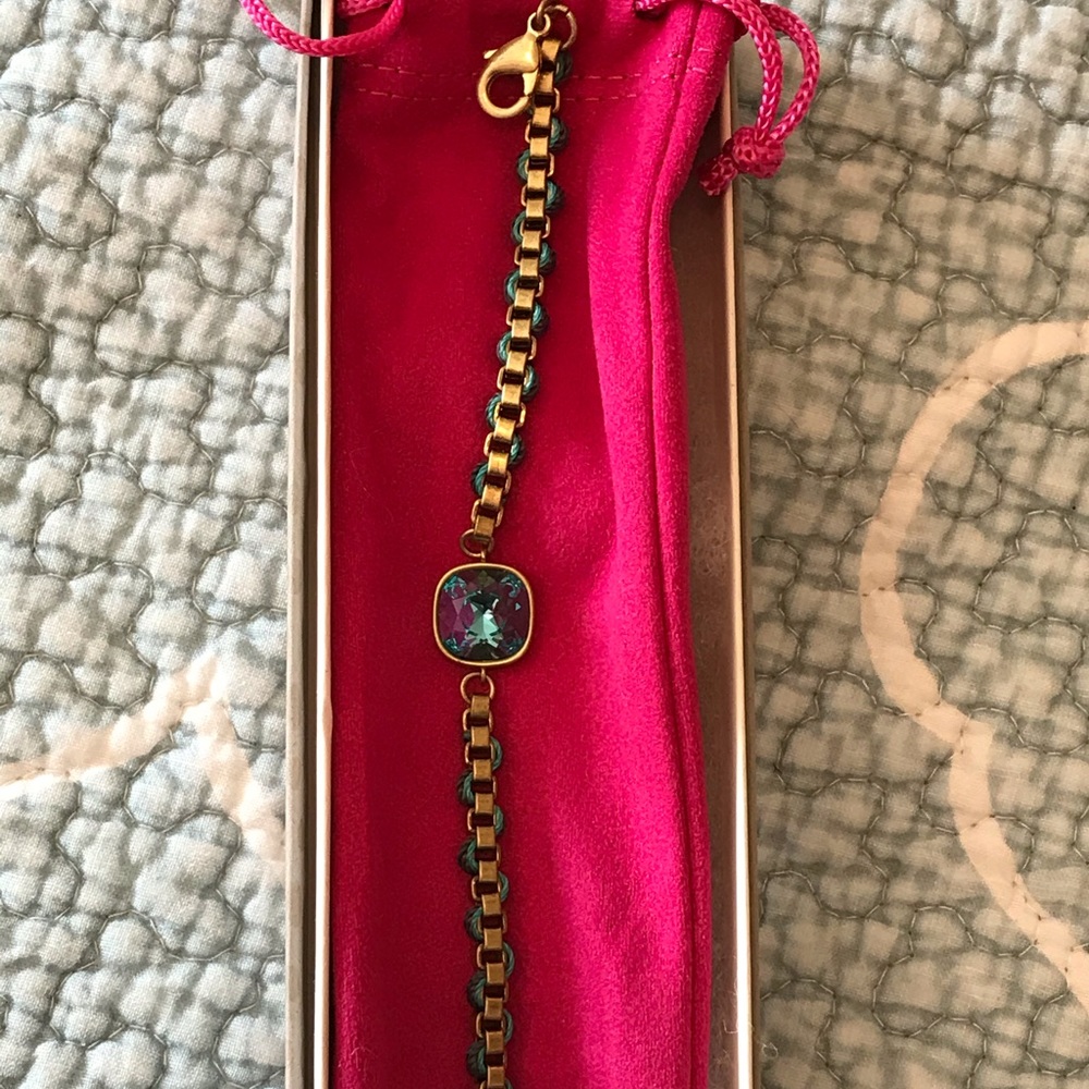 Brass bracelet with emerald